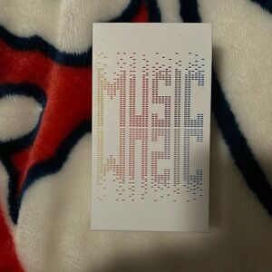 Brand new MP3 player that comes with box, charger, and headphones